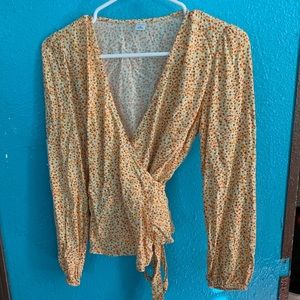 It is a long sleeve shirt. The brand is Old Navy size extra small for women.